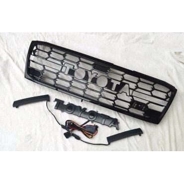 Toyota Land Cruiser LC100 2006+решетка радиатора с LED лого стиль GR